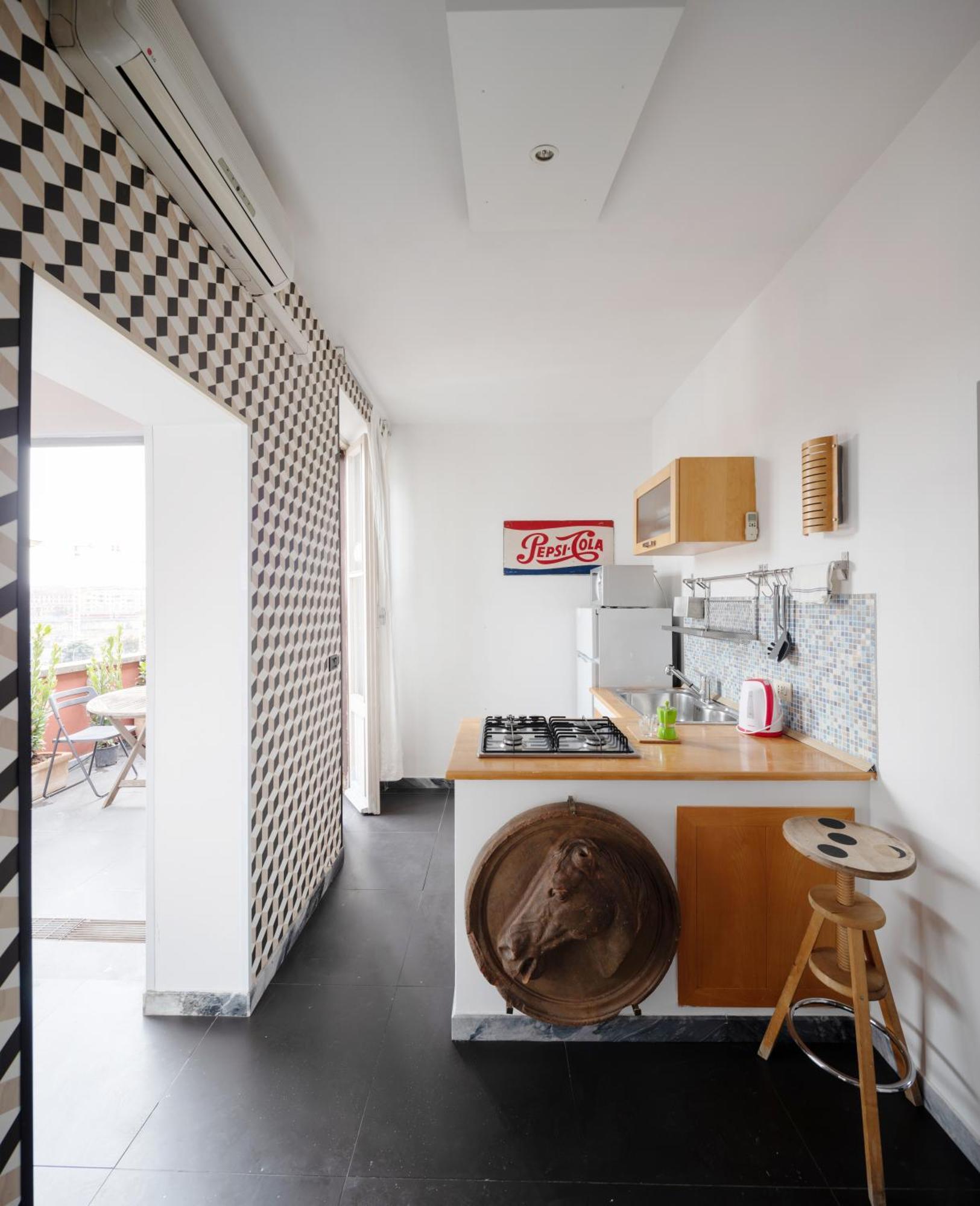 Apartment Attic With Terrace In San Lorenzo Rom
